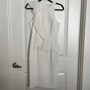 White knee length dress